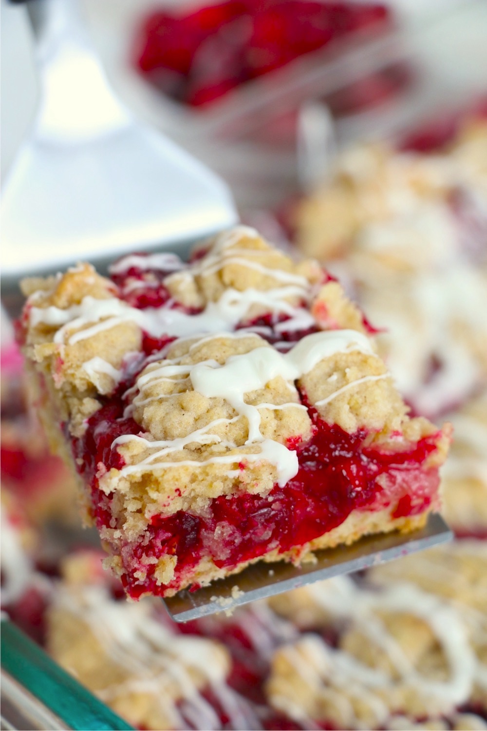 Spatula holding up a cranberry bar