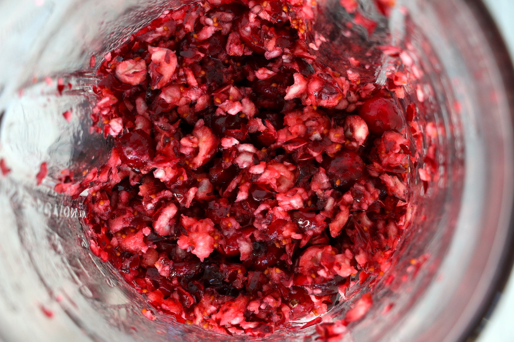 Cranberry Fluff - Tangy, chilled cranberries and sweet crushed pineapple, folded into marshmallow-filled whipped cream makes this side dish a family favorite!