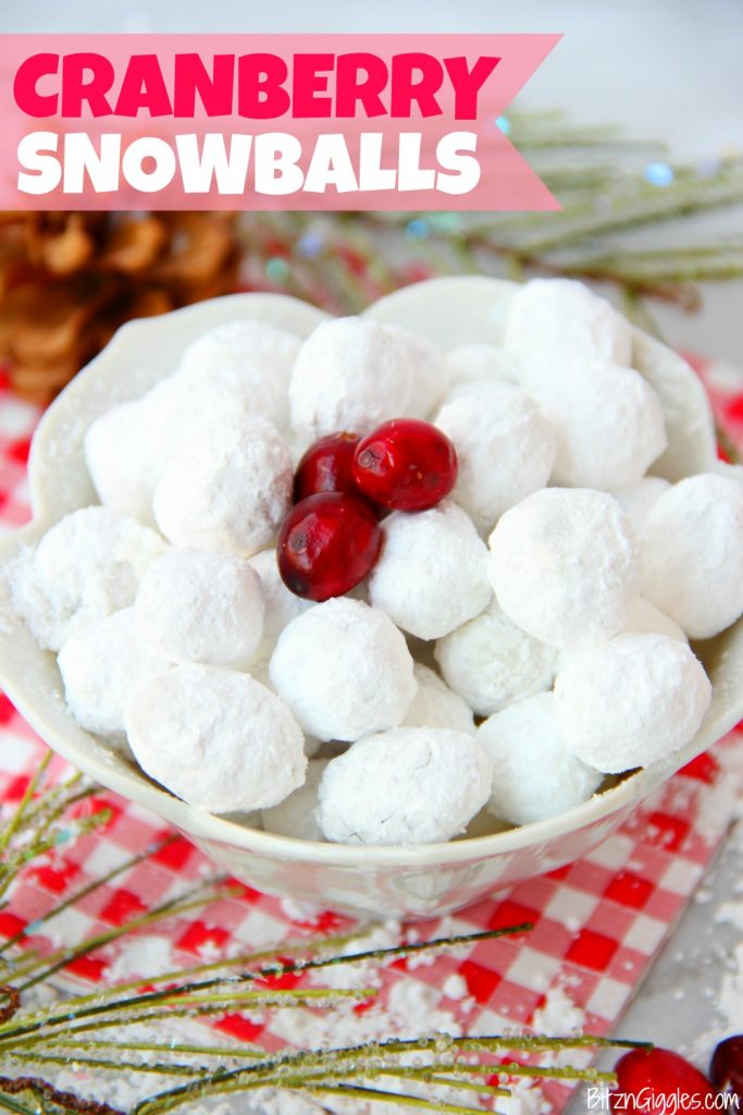 Cranberry Snowballs -Fresh cranberries rolled in powdered sugar then baked and chilled. Surprise your guests with a burst of delicious cranberry when they bite into these sweet and tangy confections!