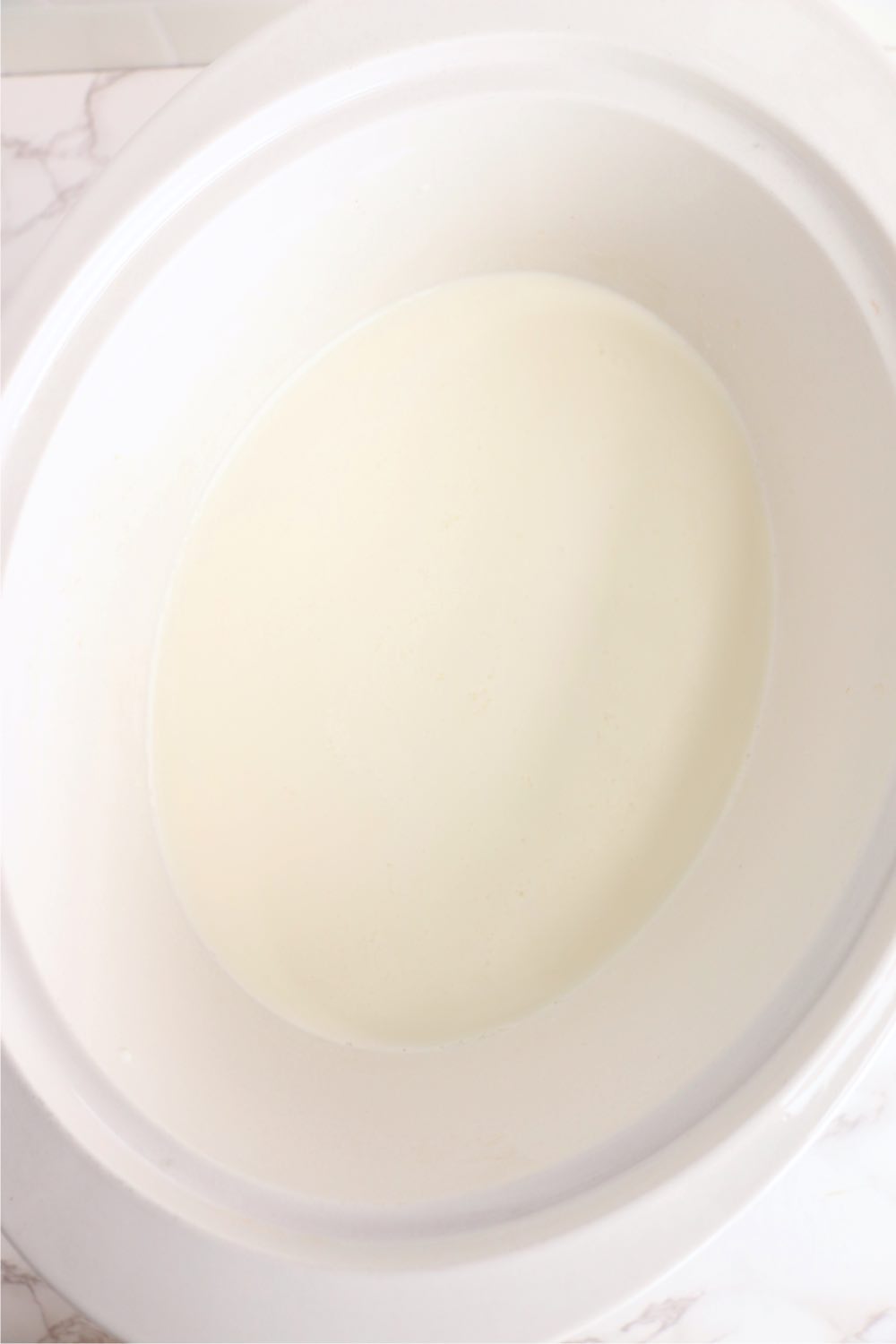 crockpot filled with milk