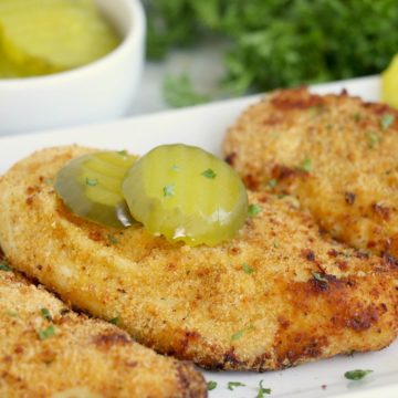 Chicken breasts with pickle slices on top