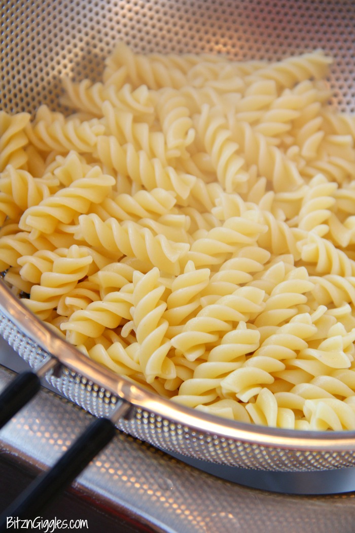 Tuna Noodle Casserole - Pasta and tuna in a creamy sauce topped with cheese and french fried onions! The perfect casserole for busy weeknights!