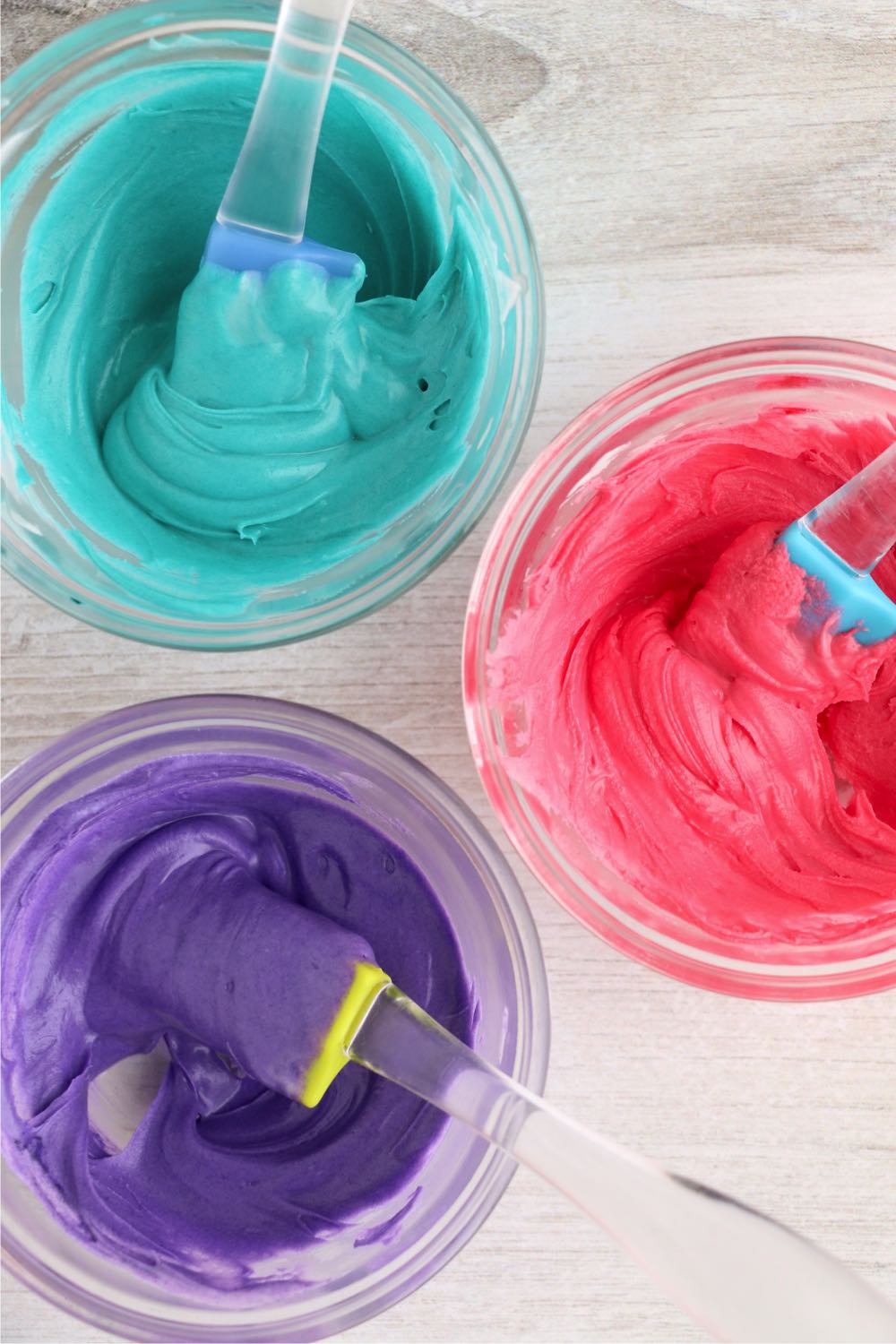 three bowls of colored vanilla bark