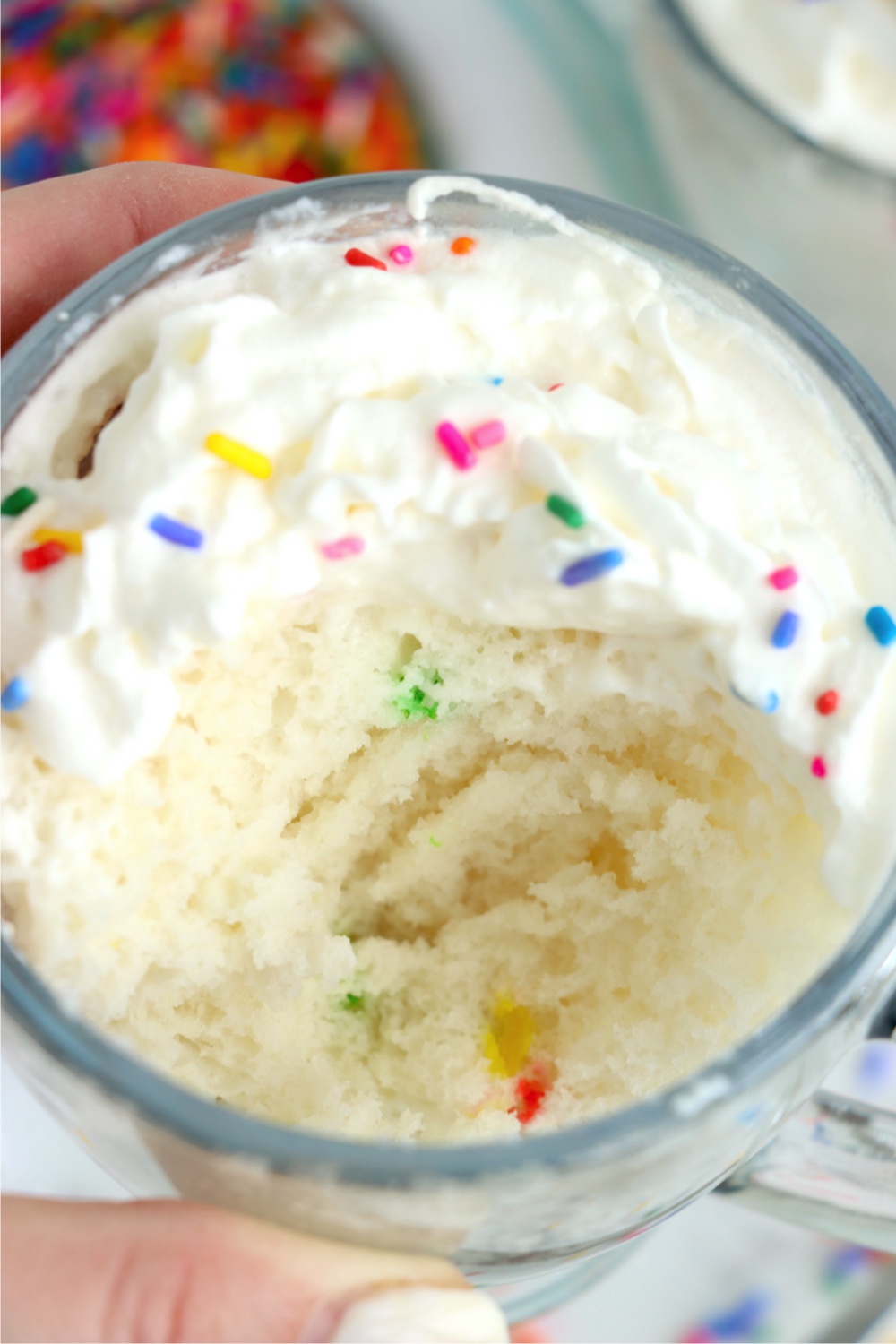 half eaten cake out of a mug