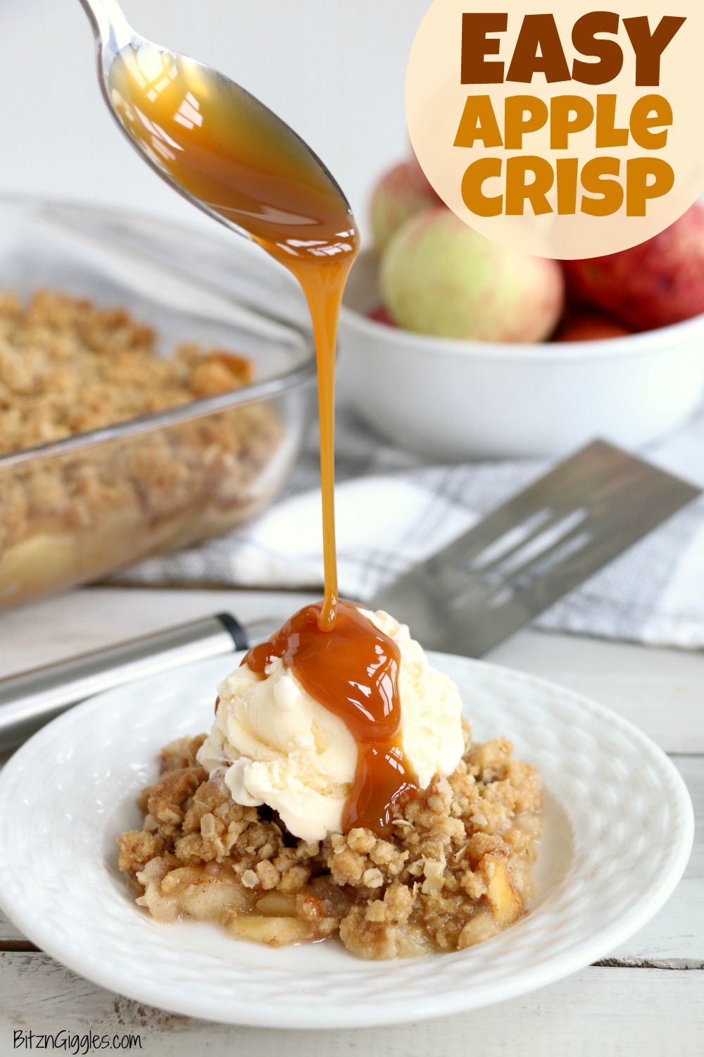 Easy Apple Crisp - A delicious, old-fashioned crisp made with sliced apples and a crunchy brown sugar oat topping. A scoop of vanilla ice cream and salted caramel sauce puts it over the top!