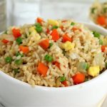 white bowl filled with fried rice and vegetables