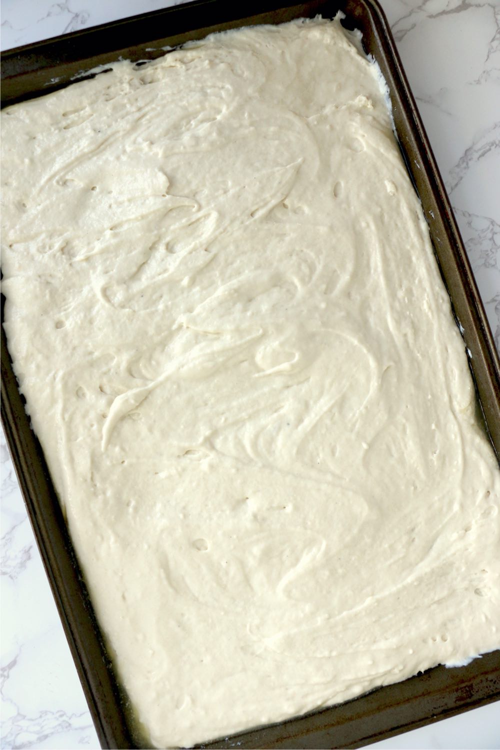 sheet pan filled with pancake batter