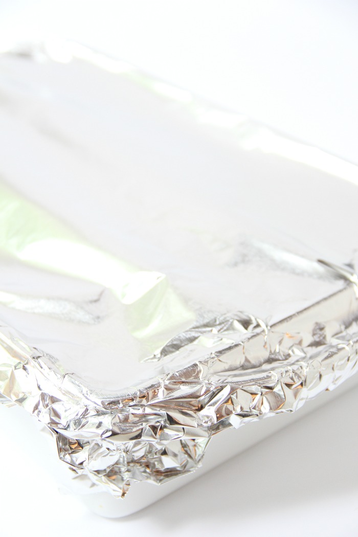 Classic Tuna Noodle Casserole - Ready in under 45 minutes, this classic and comforting casserole features tuna, onions, mushrooms, peas and cheese in a creamy sauce topped with more cheese and crunchy French fried onions! So flavorful, and sure to satisfy the entire family!