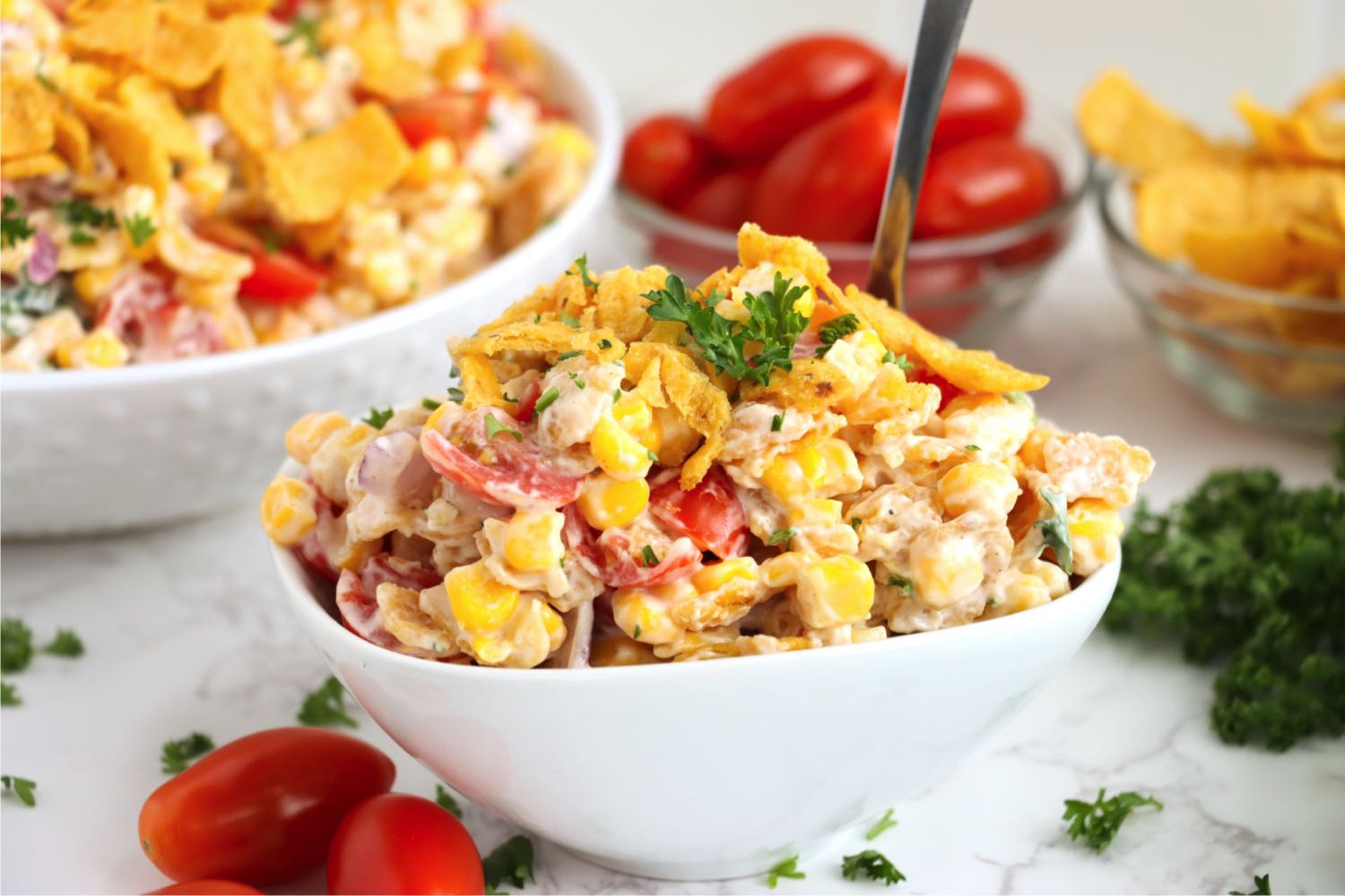 white dish filled with Fritos corn salad