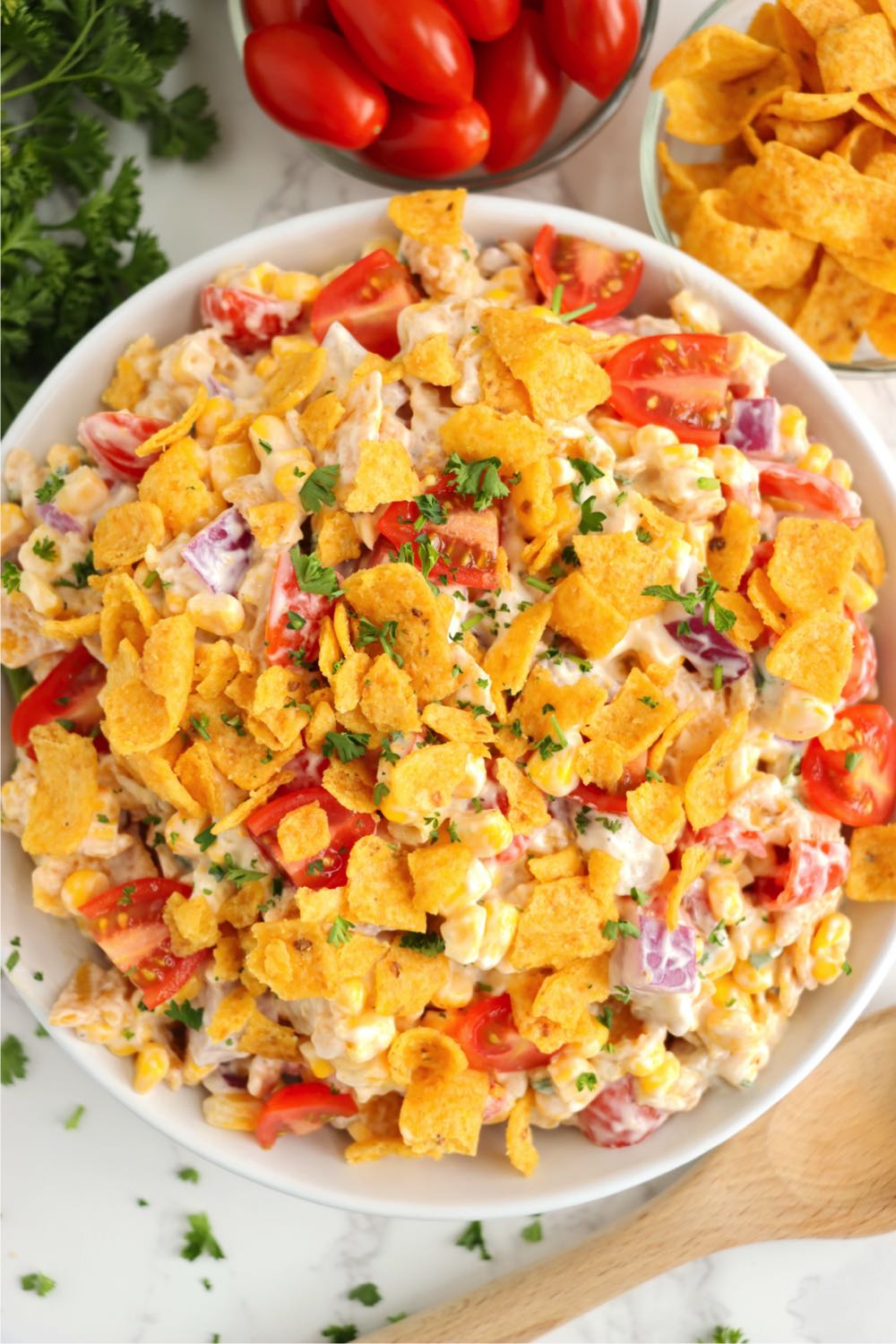 overhead shot of corn salad with Fritos garnish