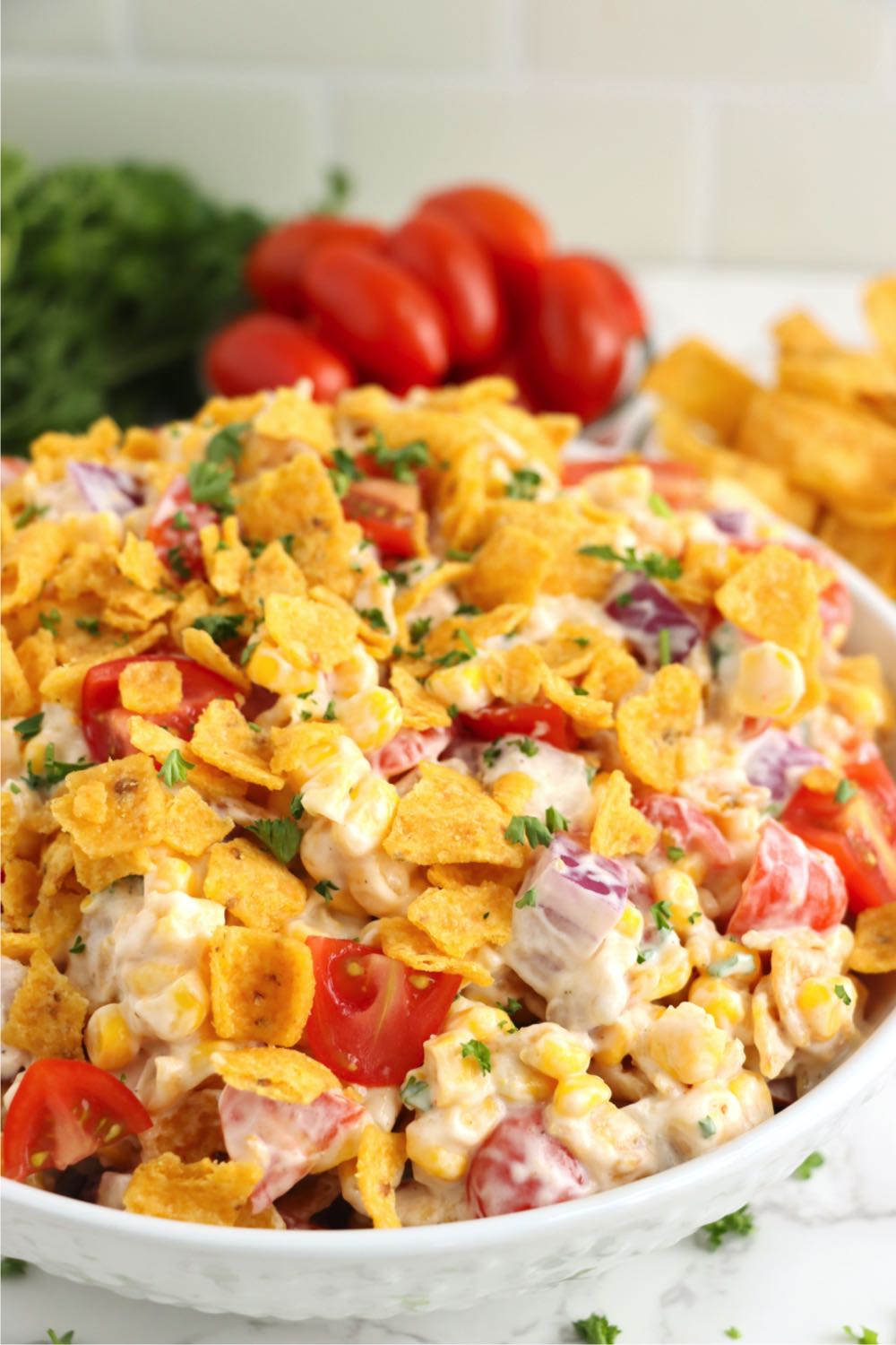 bowl filled with Fritos corn salad
