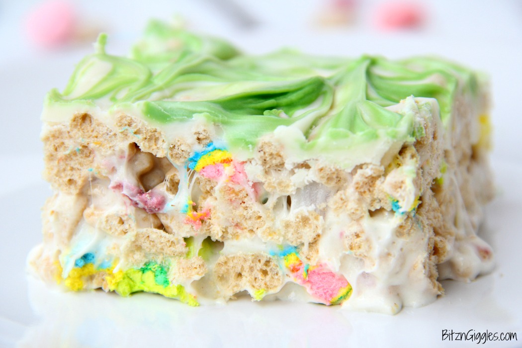 Microwave Lucky Charms Treats - Ooey, gooey, marshmallowy treats made with Lucky Charms then topped with a candy melt swirl!