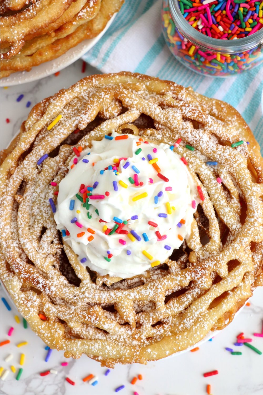 top shot of stack of funnel cakes