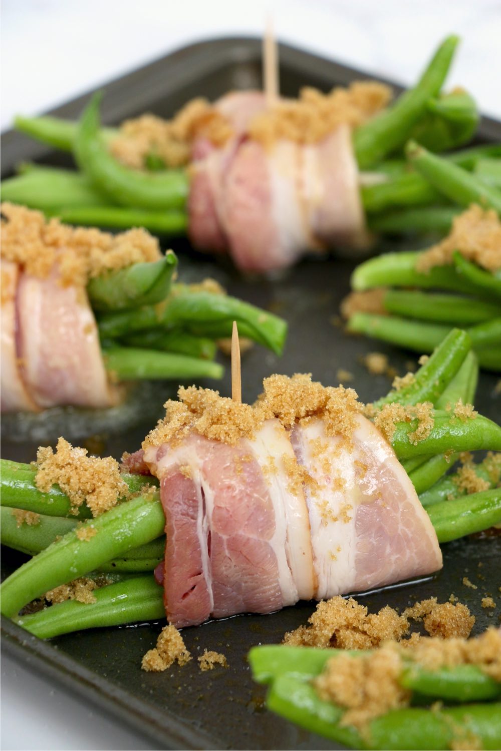 green bean bundles sprinkled with brown sugar