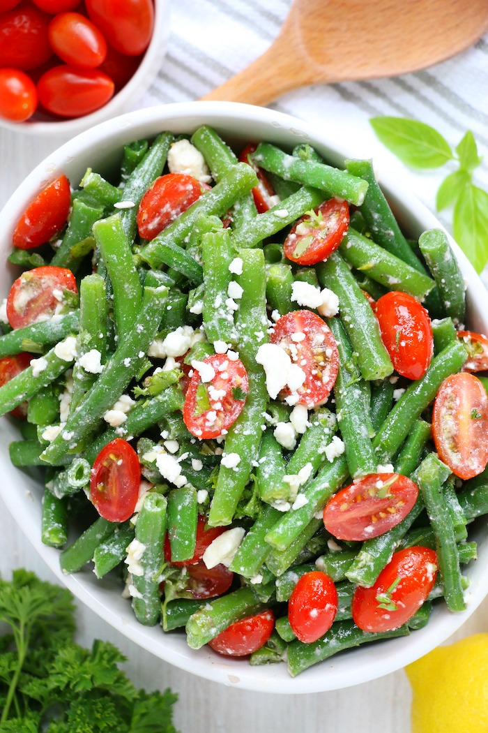 Green bean salad in bowl with feta cheese