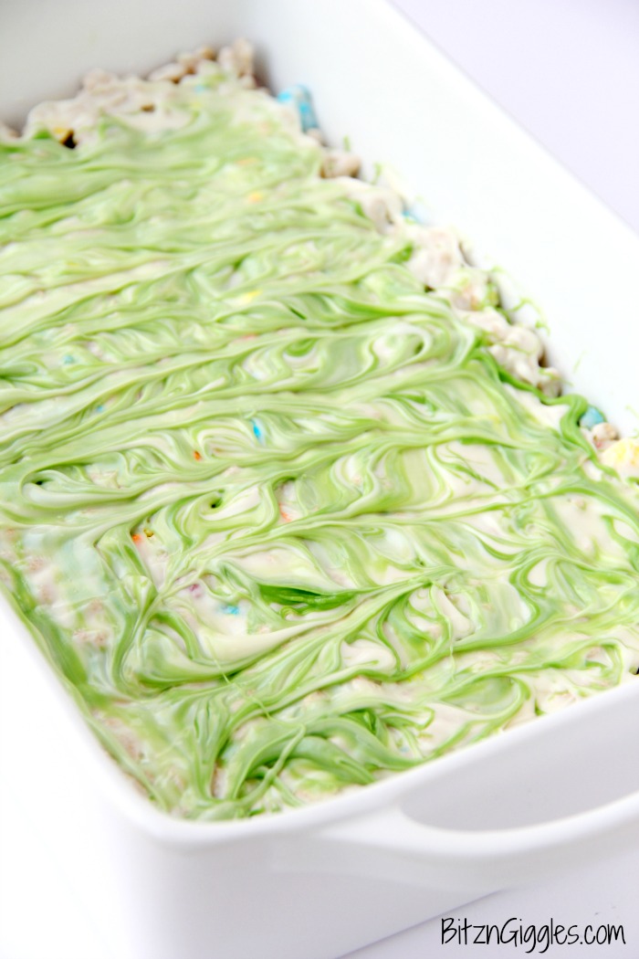 Microwave Lucky Charms Treats - Ooey, gooey, marshmallowy treats made with Lucky Charms then topped with a candy melt swirl!