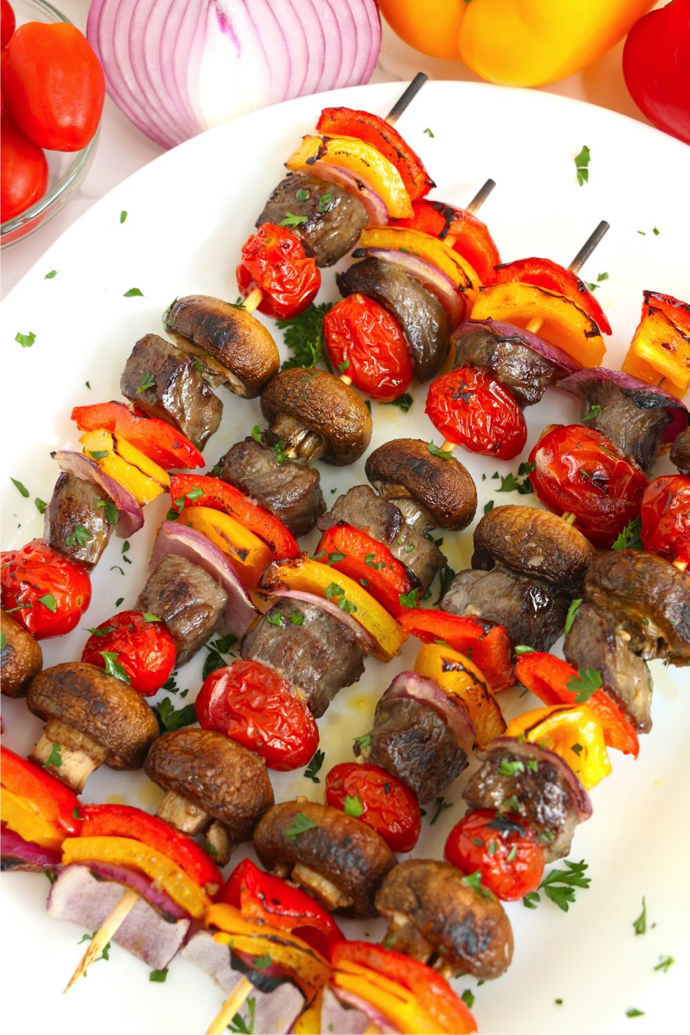 steak kabobs on white plate
