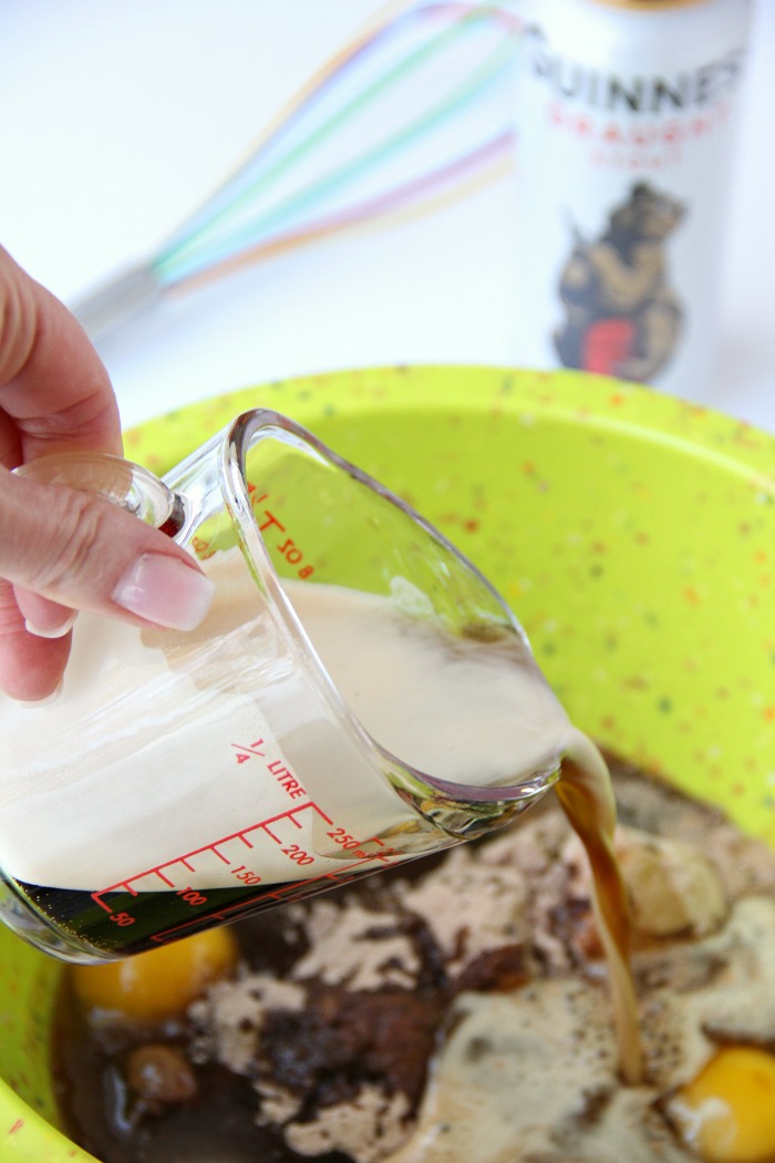 Guinness Cupcakes With Bailey's Frosting - Easy & delicious rich chocolate cupcakes spiked with Guinness and topped with creamy Bailey's Irish Cream frosting!