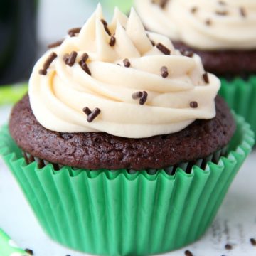 Guinness Cupcakes With Bailey's Frosting - Easy & delicious rich chocolate cupcakes spiked with Guinness and topped with creamy Bailey's Irish Cream frosting!