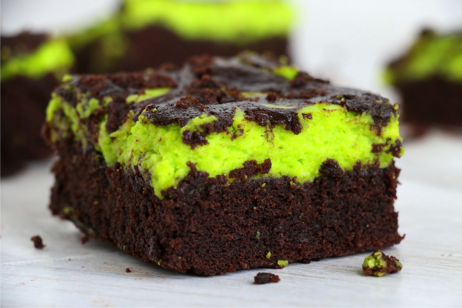 Halloween brownies with a green cream cheese layer