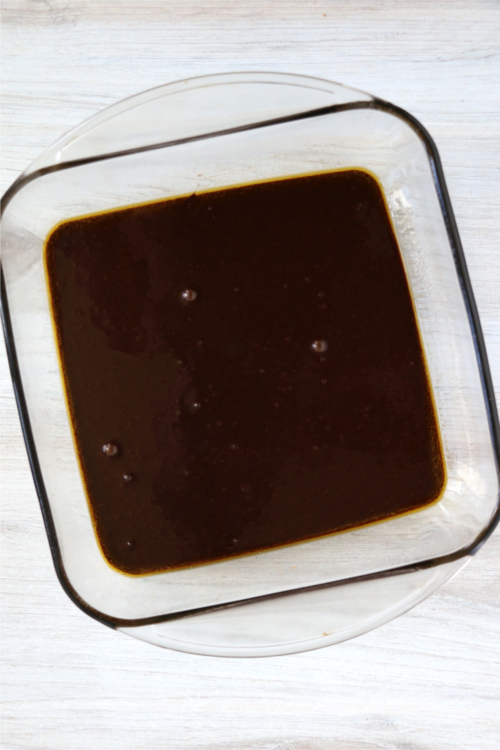 brownie batter in clear baking dish