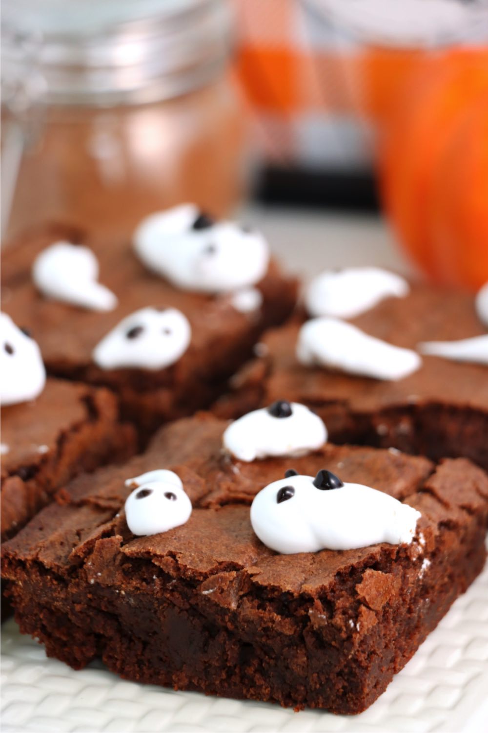 pieces of brownies with homemade marshmallow shaped like ghosts