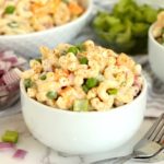 small bowl of macaroni salad with ham and peas