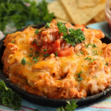 warm bean dip in a dish with cheese