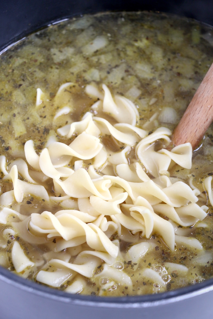 Adding noodles to soup