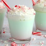 Glasses of mint hot chocolate with peppermint sticks