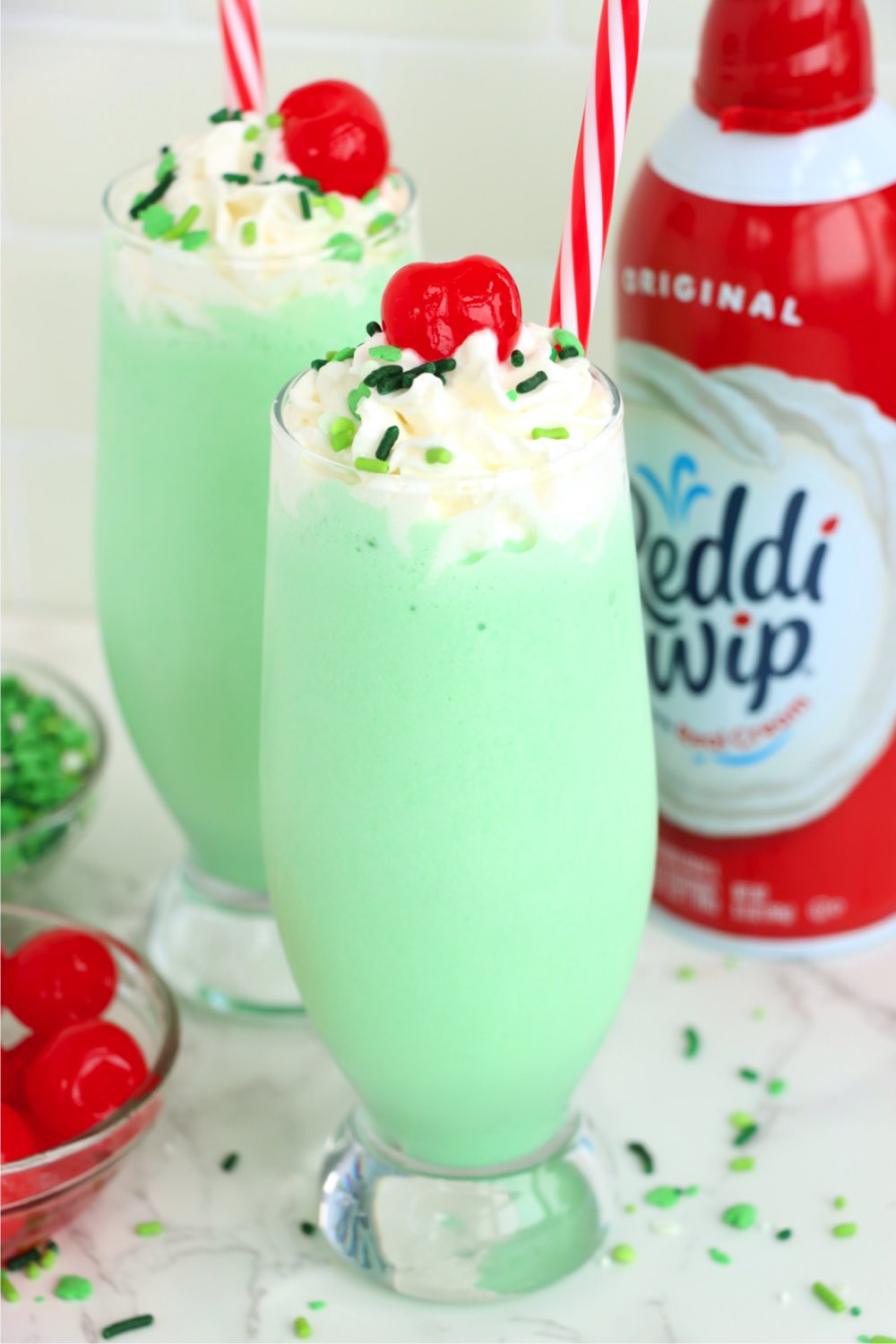 Shamrock shake with Reddi Whip in background