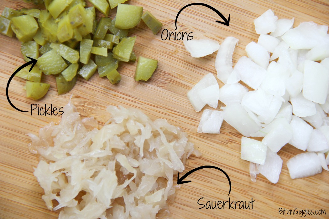 Cheese Curd Dogs -A family favorite with Wisconsin charm! Chopped onions, pickles, sauerkraut and cheese curds make this dog irresistible!