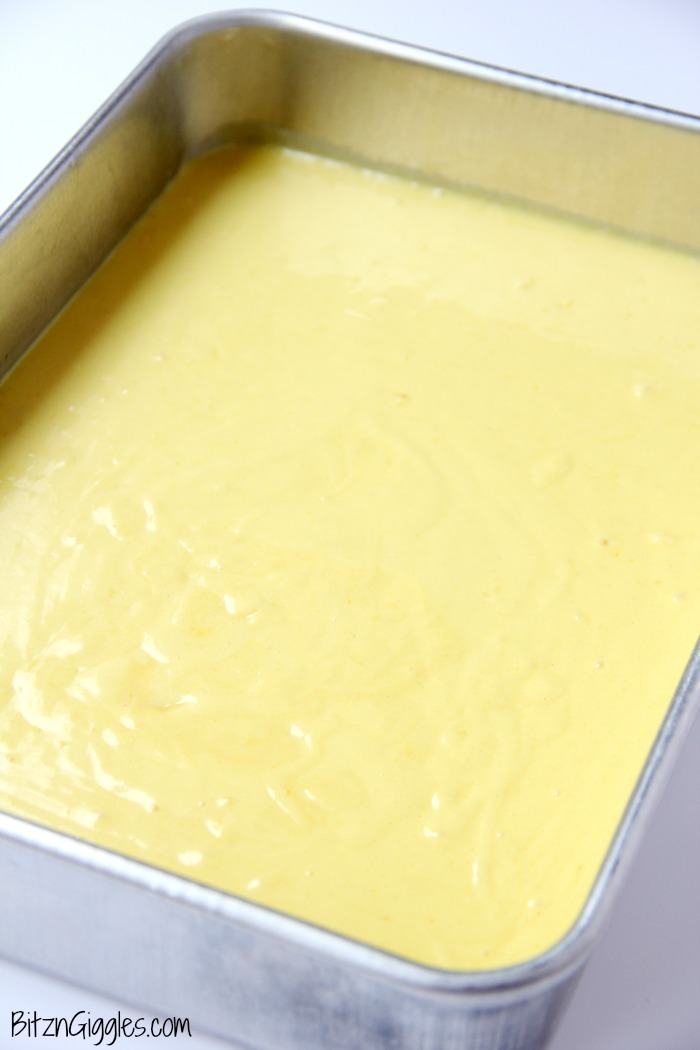 Lemon Jello Cake - Easy, delicious and moist, this lemon jello cake is so refreshing with a dollop of whipped cream on top!