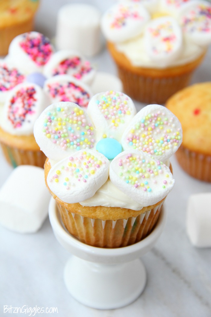 Marshmallow Flower Cupcakes - Funfetti cupcakes with sprinkled marshmallow flowers perfect for spring!