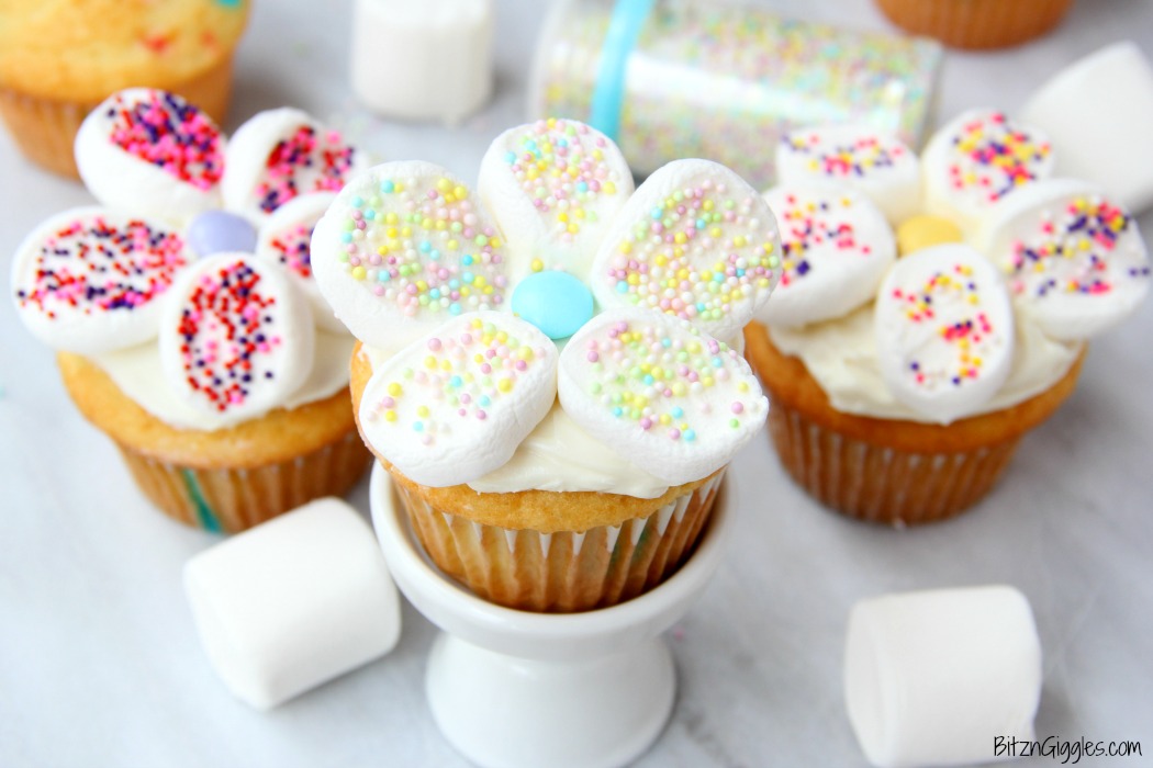 Marshmallow Flower Cupcakes - Funfetti cupcakes with sprinkled marshmallow flowers perfect for spring!