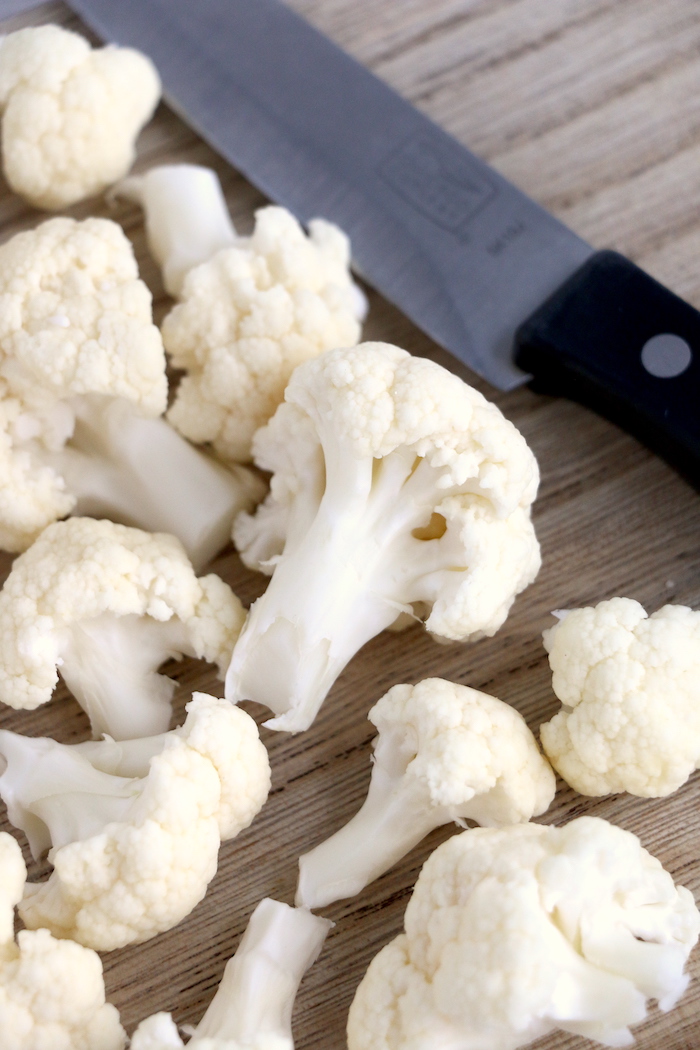 cutting up cauliflower florets
