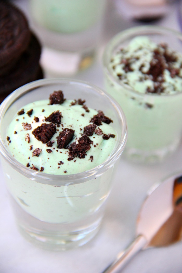 Mint Oreo Pudding Shots - Perfect for the holidays, St. Patrick's Day or just whenever you're in the mood for a little taste of mint and chocolate. These taste just like an adult version of a Thin Mint Girl Scout Cookie!