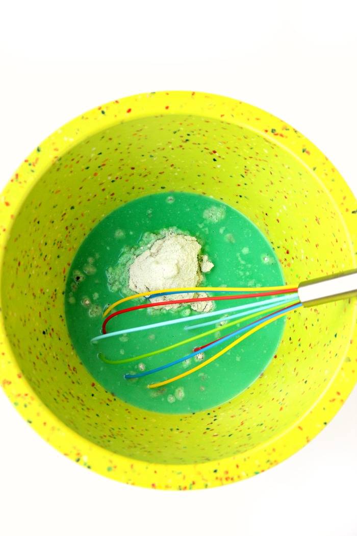 Mint Oreo Pudding Shots - Perfect for the holidays, St. Patrick's Day or just whenever you're in the mood for a little taste of mint and chocolate. These taste just like an adult version of a Thin Mint Girl Scout Cookie!