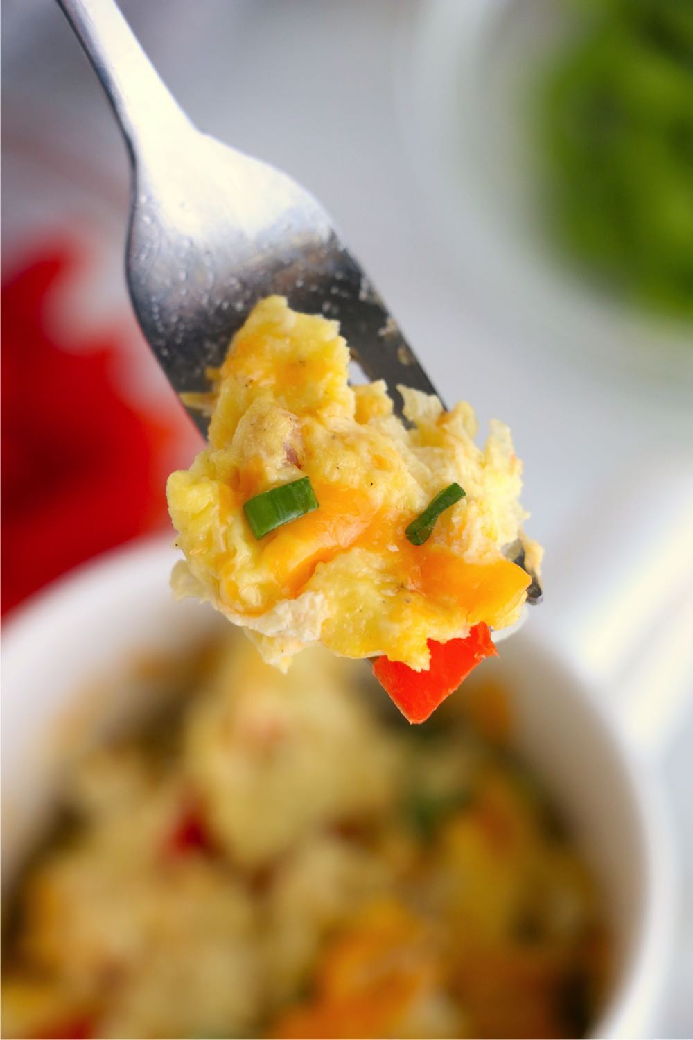 fork with a bite of omelet