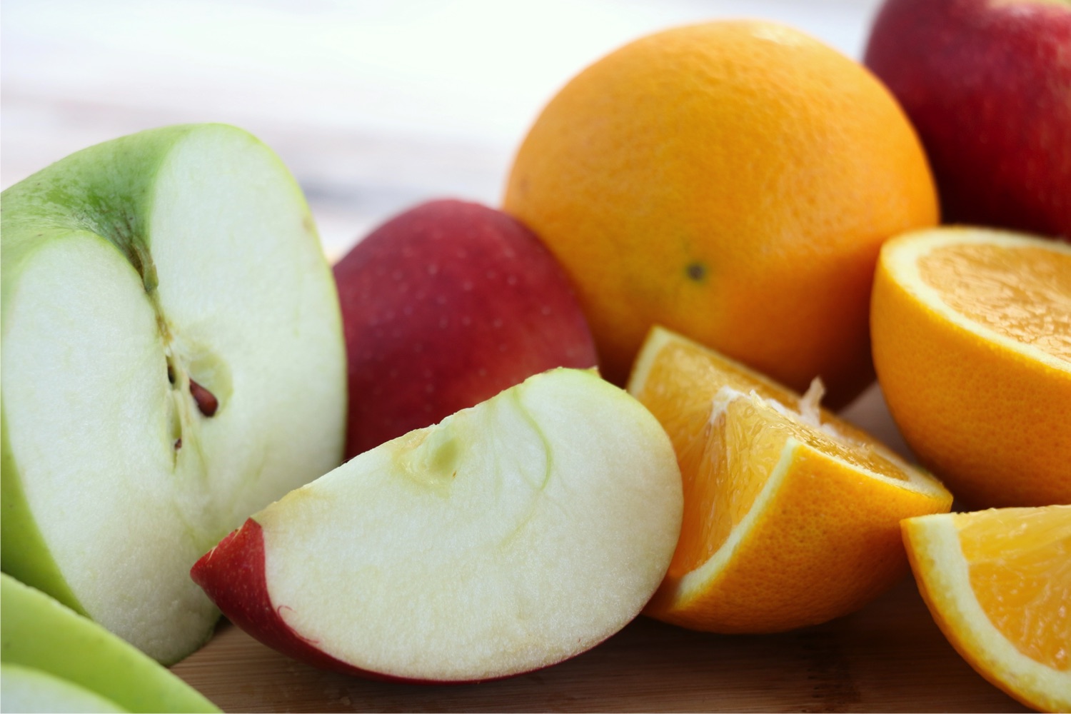 Sliced apples and oranges