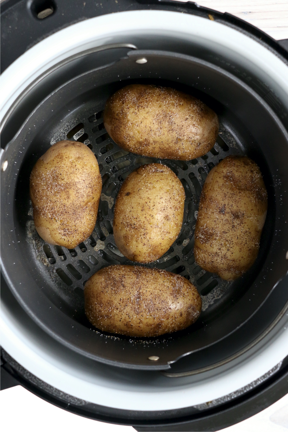 baked potatoes in the Ninja Foodi cooking pot