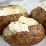 Baked potatoes with butter and sour cream