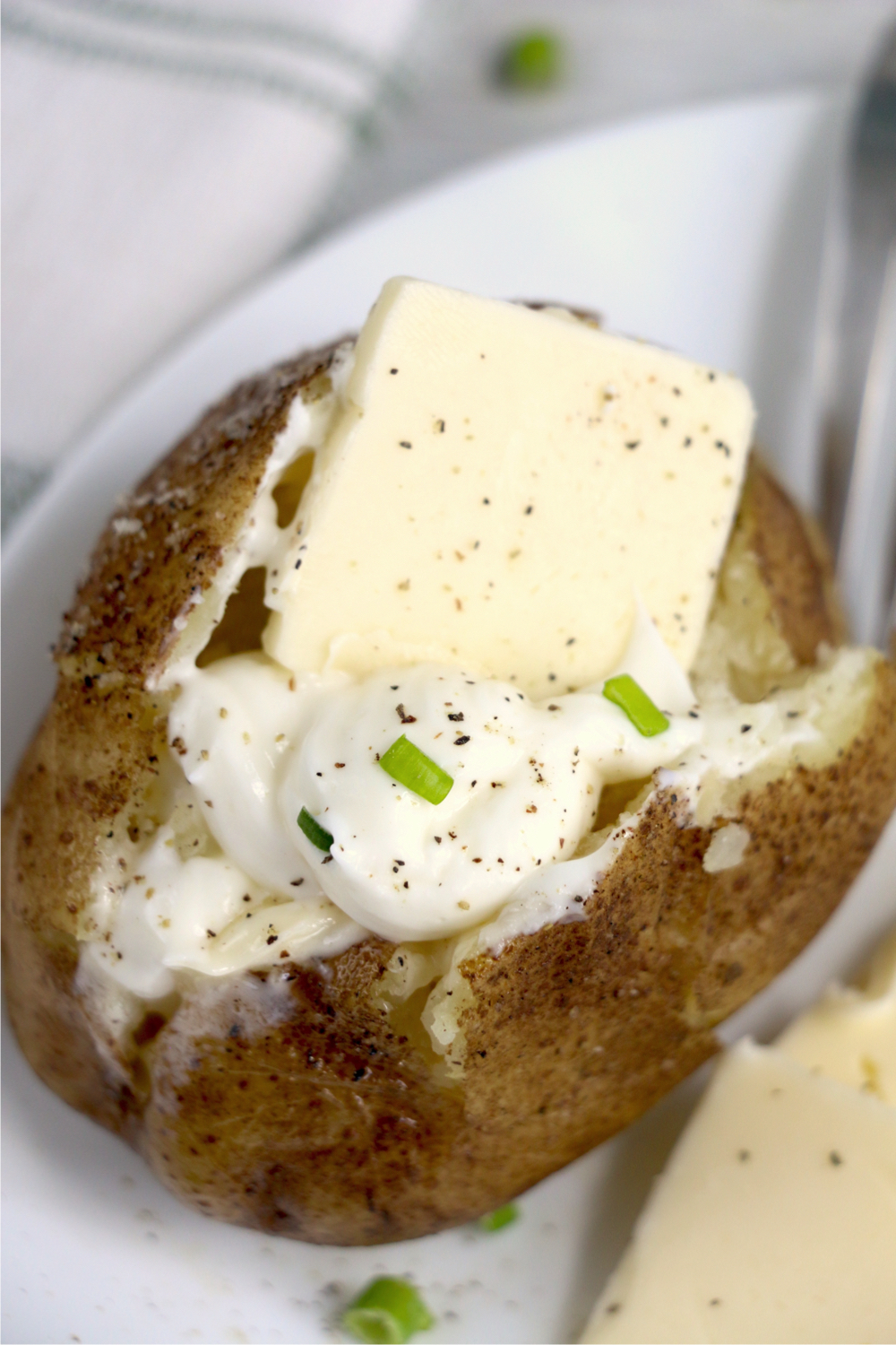 up close shot of loaded baked potato