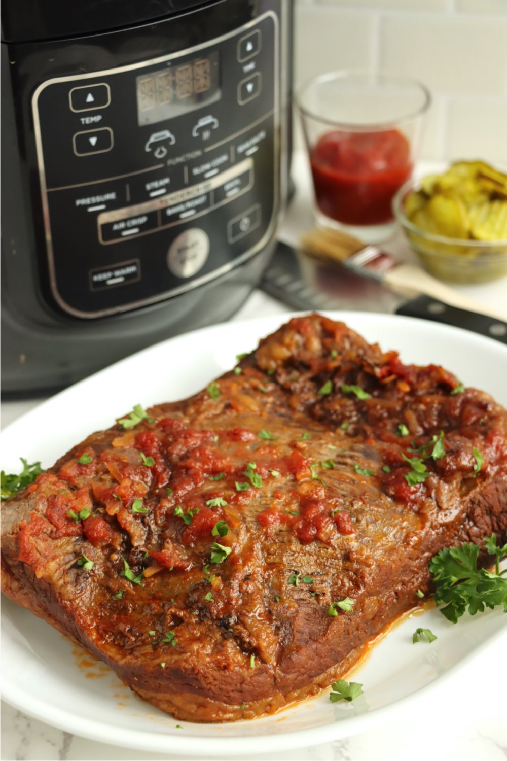 Beef brisket in front of Ninja Foodi