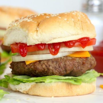 Burgers topped with ketchup