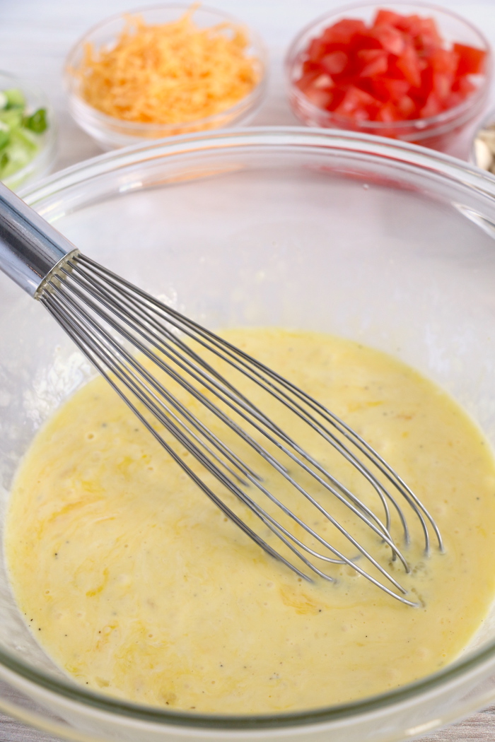 mixing eggs for egg bites