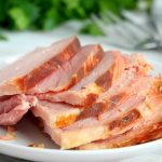 fork picking up a slice of ham