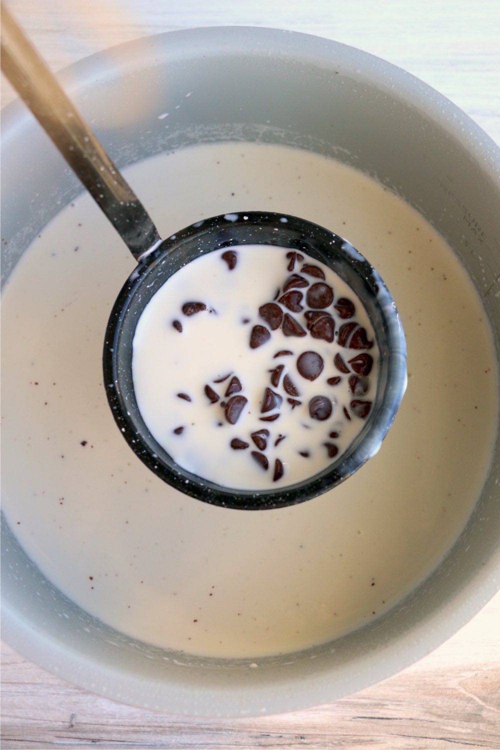 ladle full of cream and chocolate chips