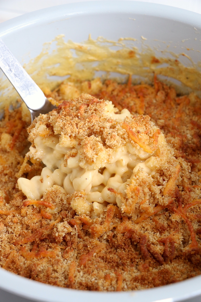 Scooping out mac and cheese from the Ninja Foodi