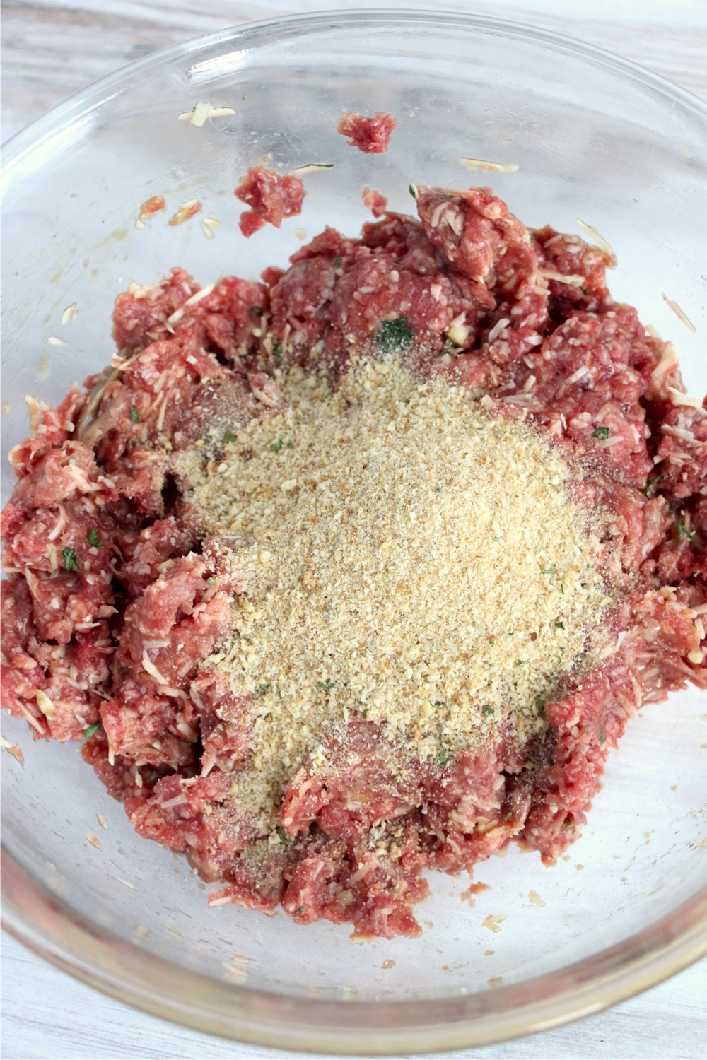 Mixture of meatball ingredients and bread crumbs